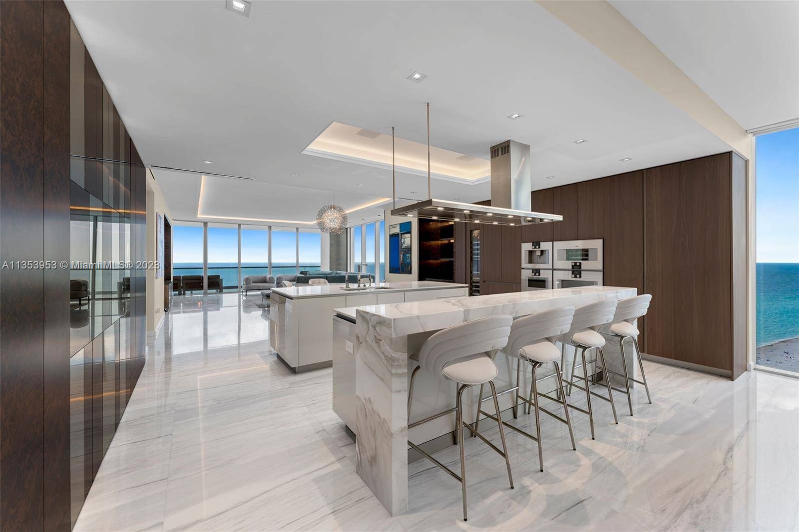 This luxurious, one of a kind 4 bedroom, 4 1 half bathroom home in the sky at the coveted Turnberry Ocean Club offers SE exposure providing stunning, unobstructed 180 degree ...