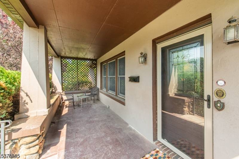 Step back in time to this classic American Foursquare home with tons of charm and original features.
