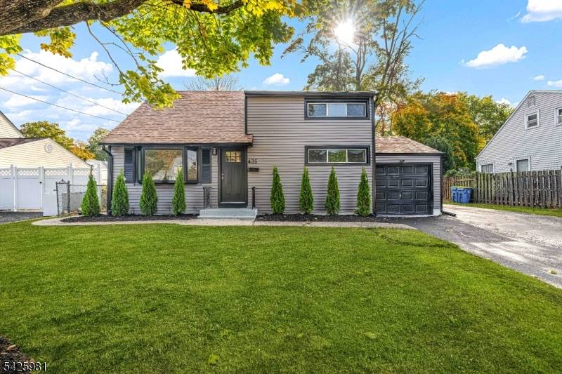 Tucked away on a quiet, tree lined street, this four bedroom, two and a half bath home offers a warm and inviting feel from the moment you arrive.
