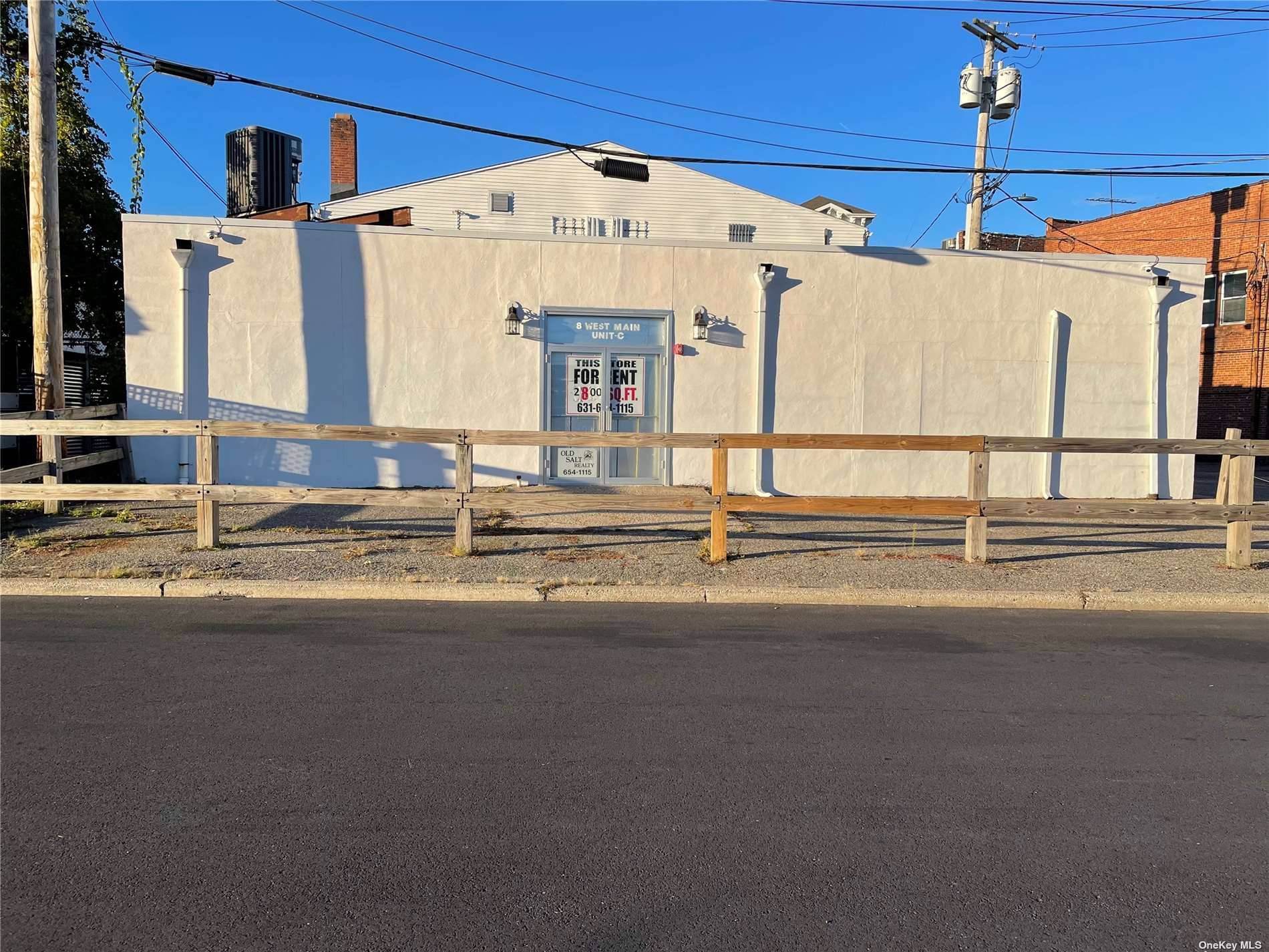 Patchogue Village Storefront Facing Municipal Parking.