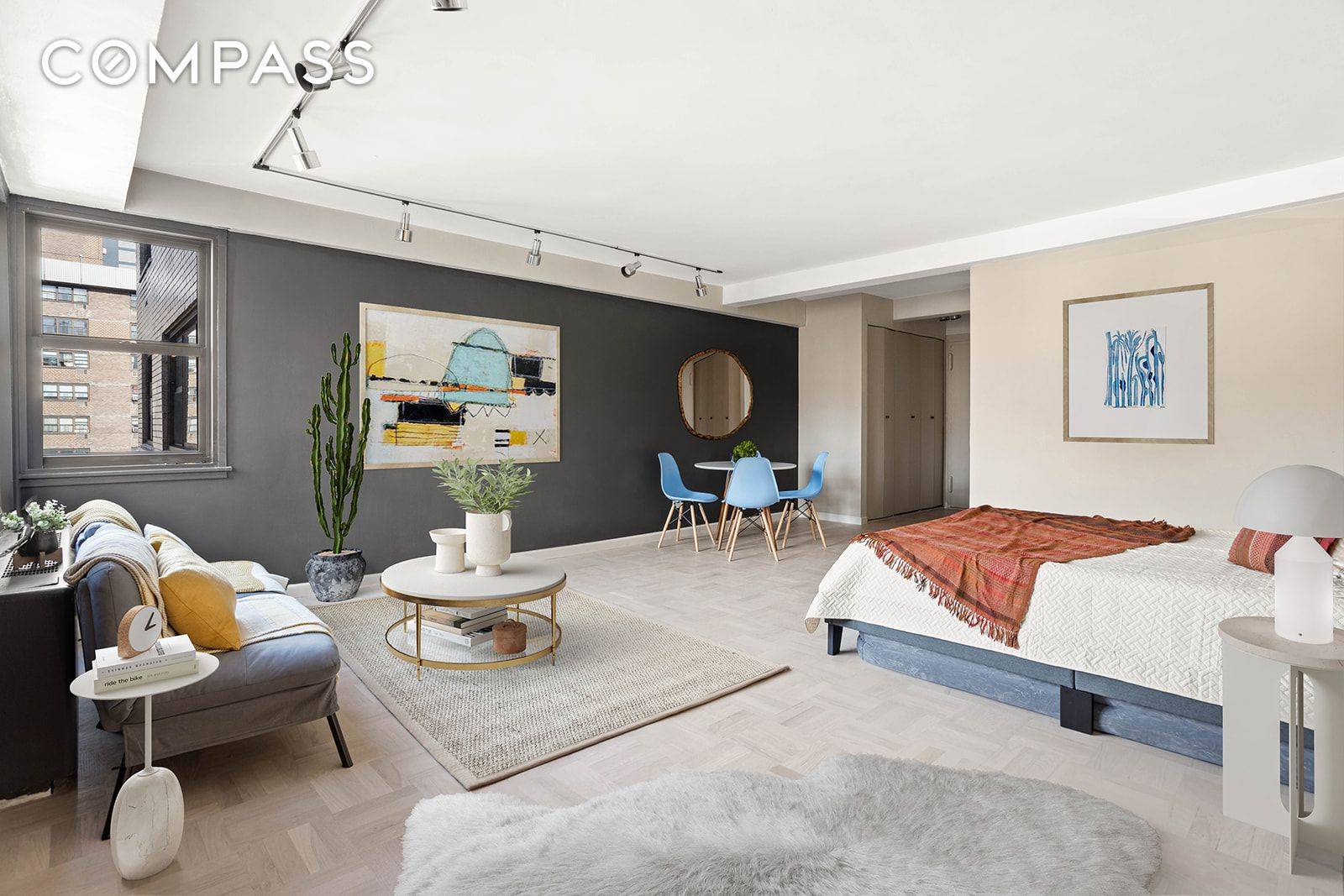 EXTRA EXTRA BUILDING JUST LOWERED MAINT by 9 Move right into this spacious, renovated studio located in a well maintained cooperative building in the heart of Lenox Hill.