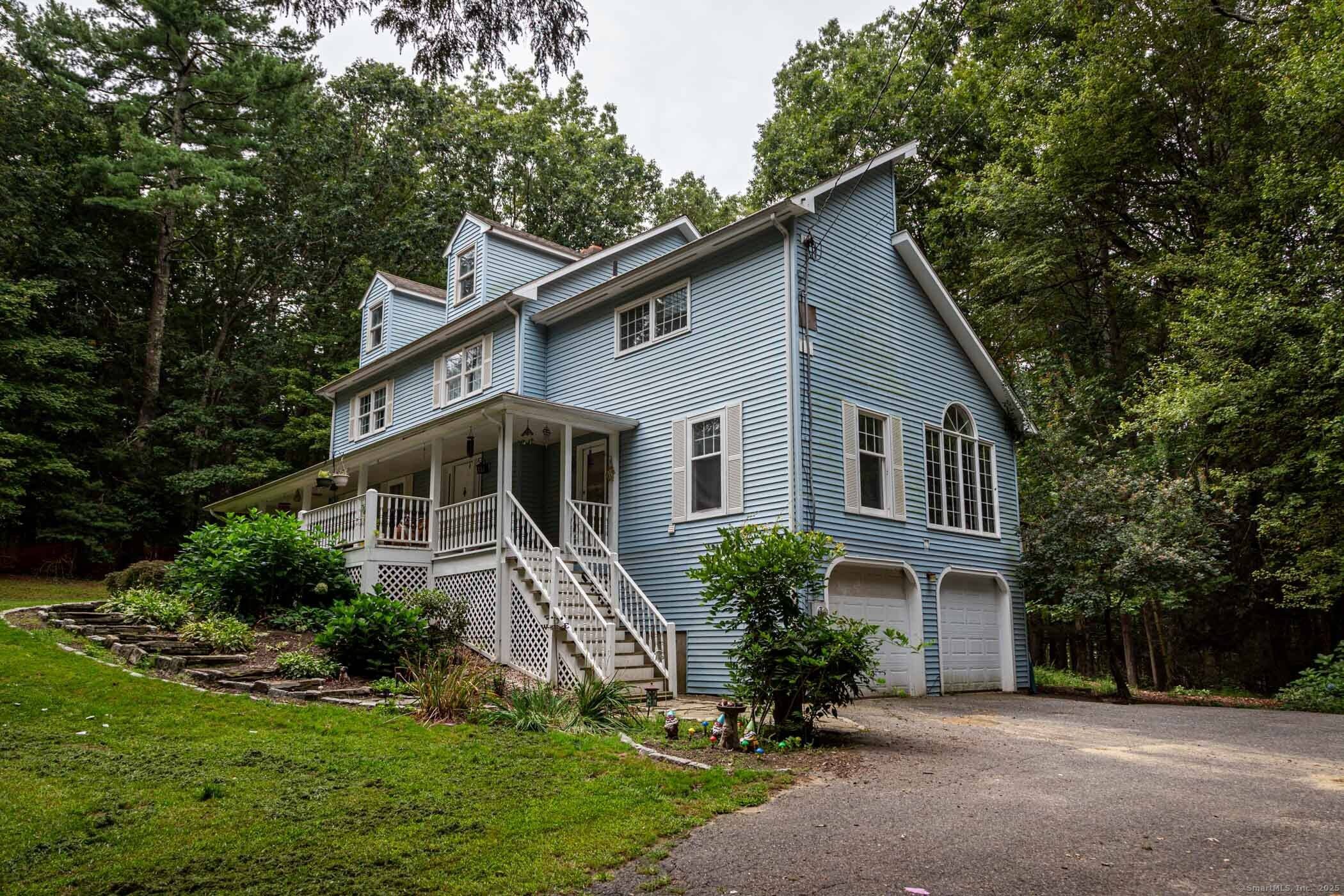 Welcome to this fantastic home, complete with a charming wrap around porch and a beautifully kept, tree filled yard that's ready to be your personal oasis.