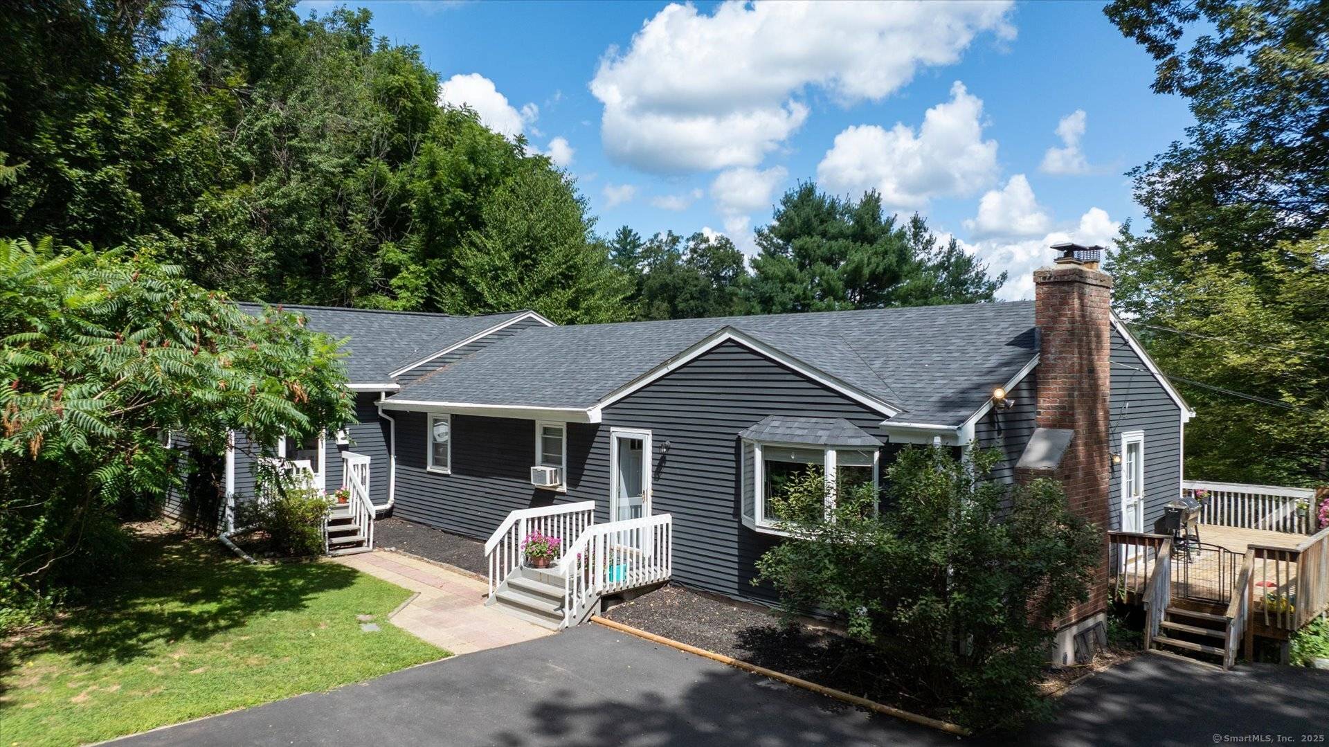 This spacious home is tucked away in a wonderful Collinsville location just steps to the Farmington River and scenic Nepaug Reservoir paved trail.