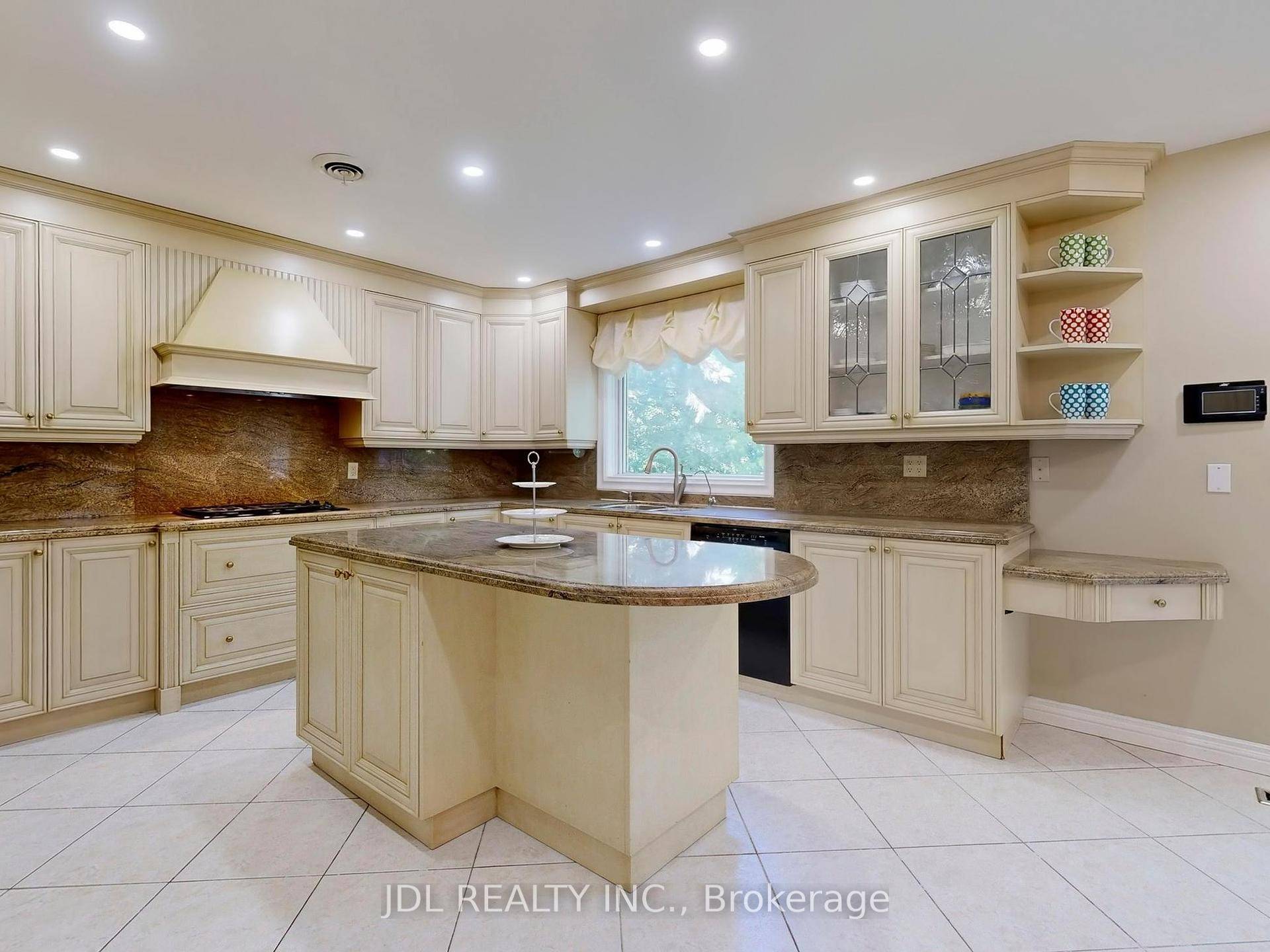 Discover an exceptional THREE CAR GARAGE residence in one of Richmond Hill's most prestigious enclaves.