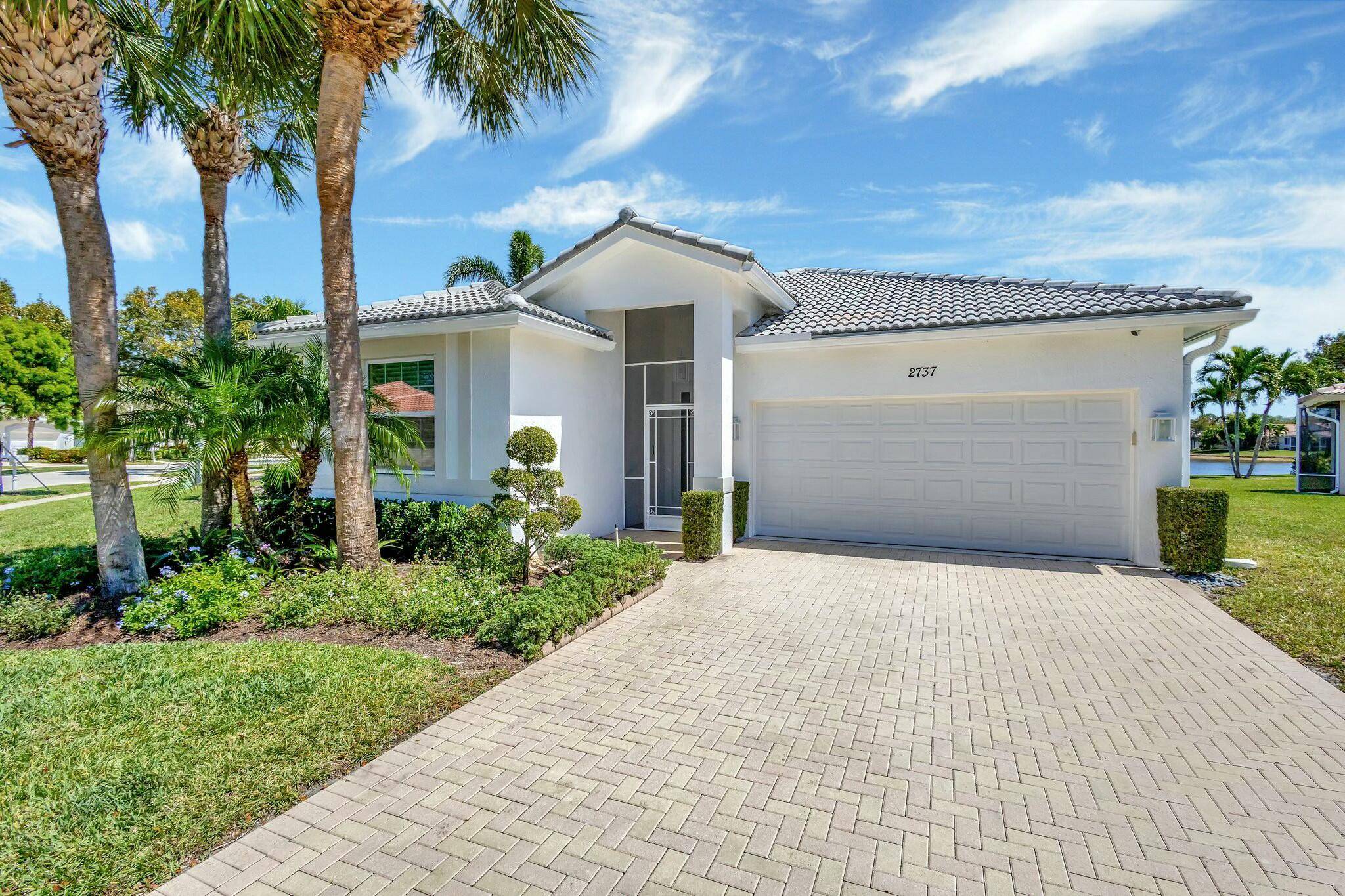 Enjoy stunning lake views in this impeccably maintained 3 2 family room home in Baywinds, a 55 pet friendly community.