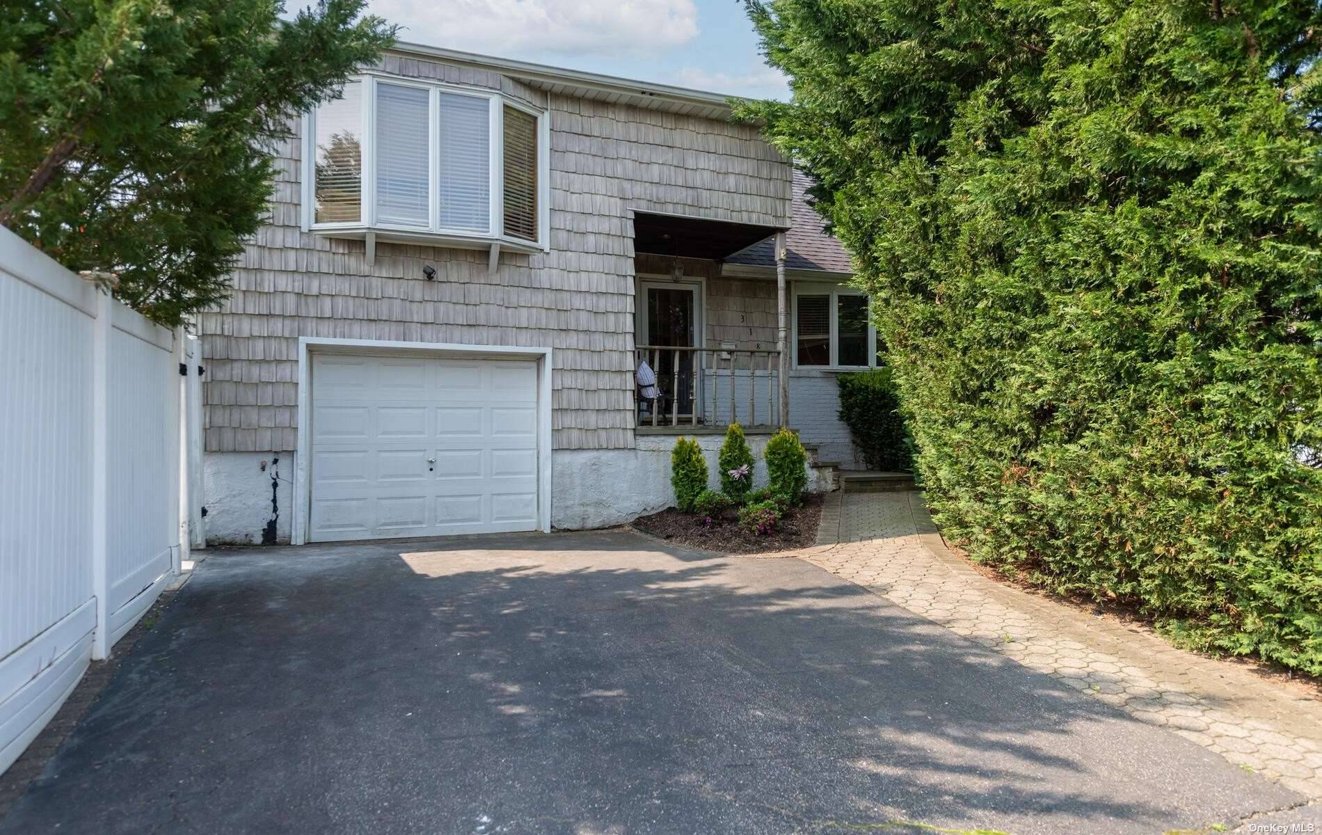 Welcome to this beautiful 3bed 2bath split level set in an idyllic North Massapequa neighborhood convenient to all !