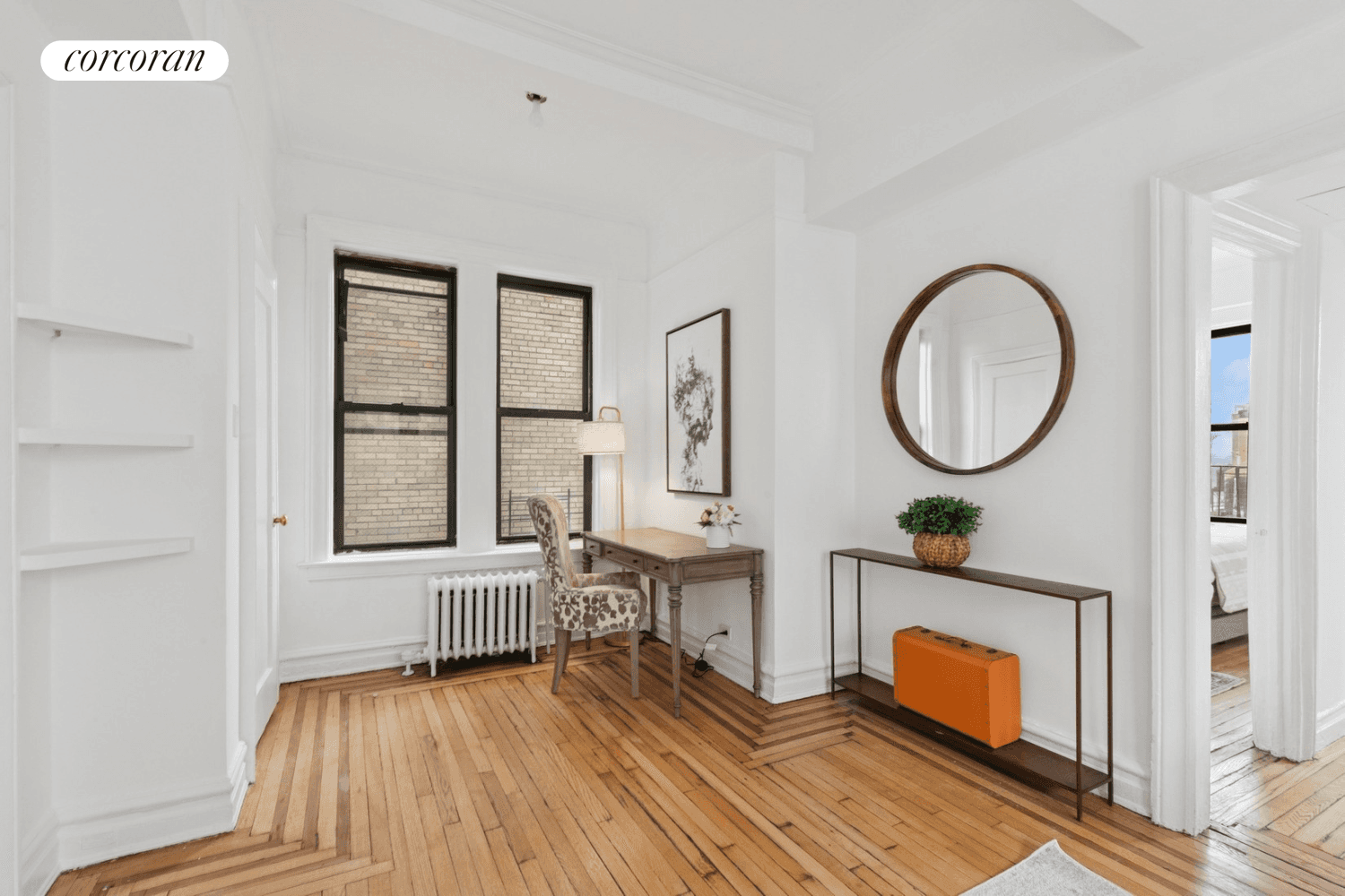 Nestled in an intimate, boutique pre war co op with just two residences per floor, this sun filled two bedroom home offers a rare blend of charm, space, and tranquility.