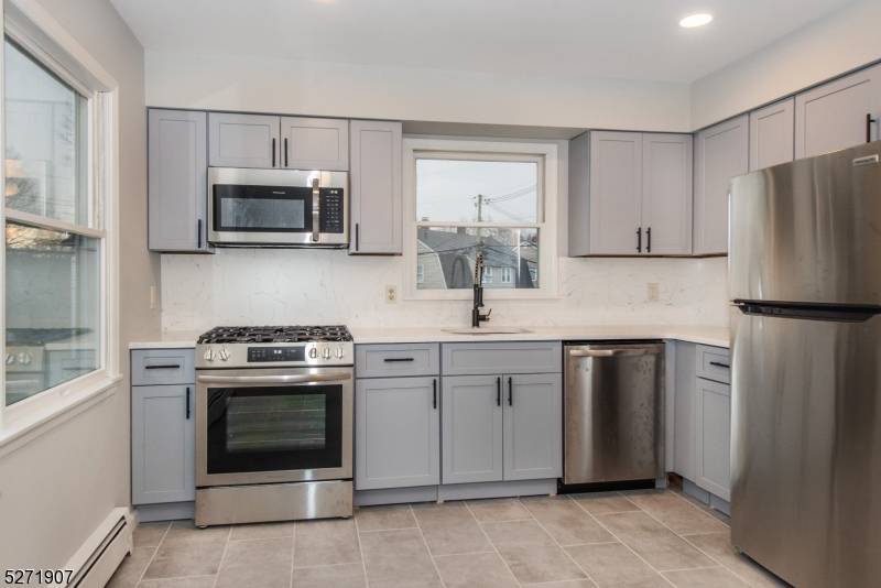 Rare opportunity to own a fully renovated, side by side duplex in the heart of Pompton Lakes, offering the perfect blend of modern luxury and investment potential.