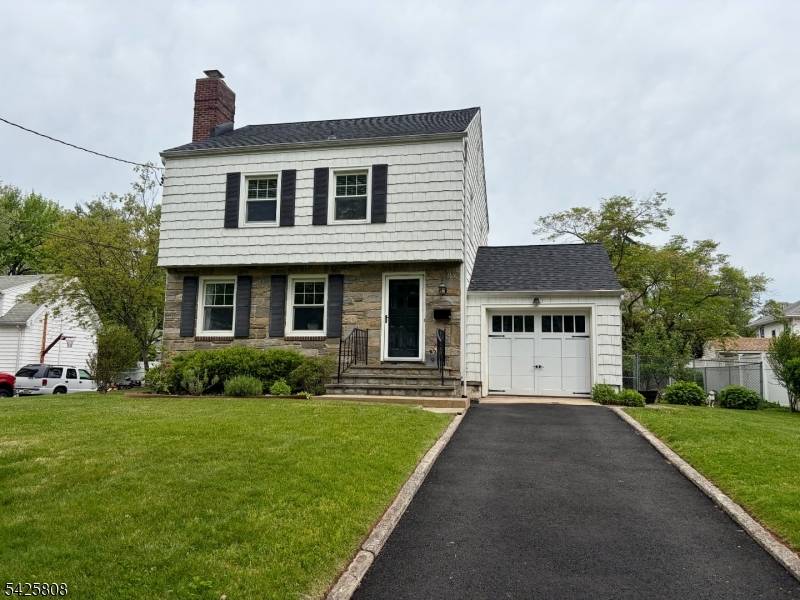 Set on a charming tree lined street in one of Cranford's most convenient neighborhoods, this delightful Colonial blends timeless character with warmth, charm, and everyday comfort.