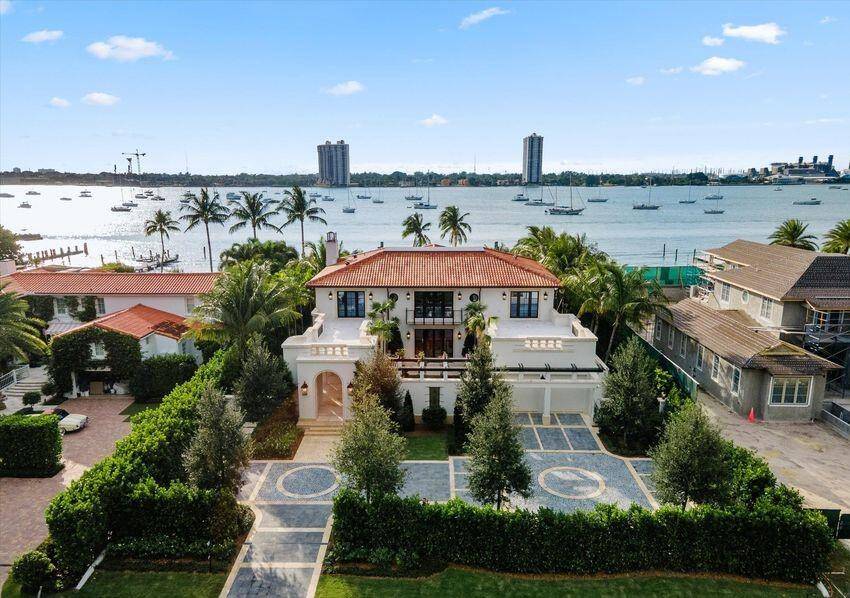 Completed new construction direct Intracoastal estate residence with concrete dockage.