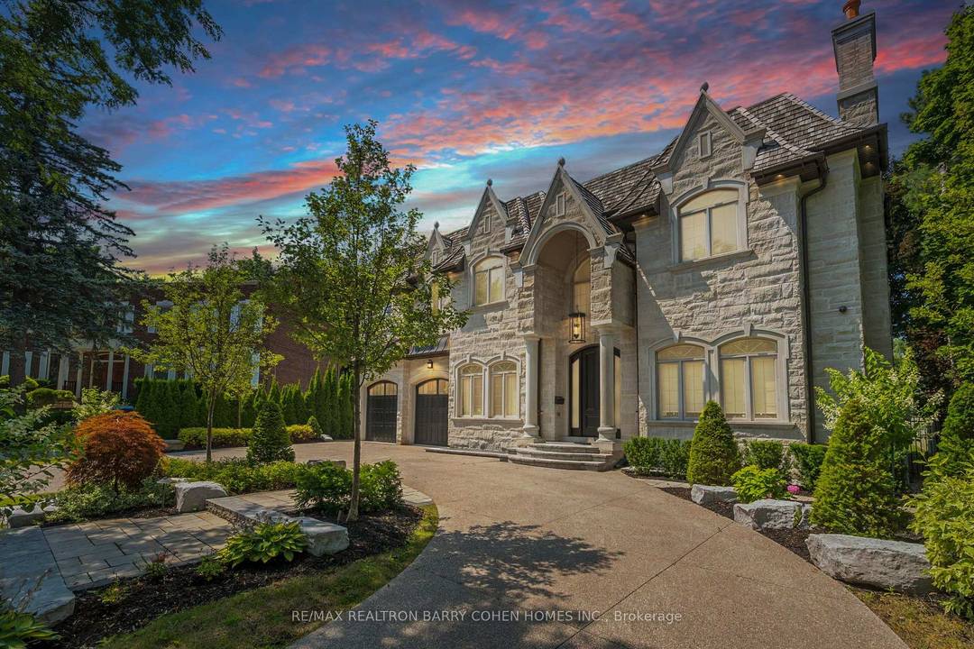 Dramatic Curb Appeal. Natural Stone Facade And Circular Drive !