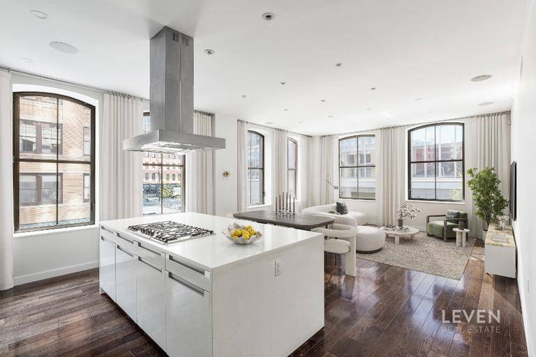 Stunning corner three bedroom residence in the heart of Tribecas historic district, set within the beautifully reimagined 250 West Street.