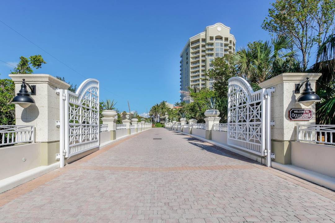 Experience unparalleled oceanfront luxury at Ocean's Edge, a privately gated enclave on the pristine sands of Singer Island.