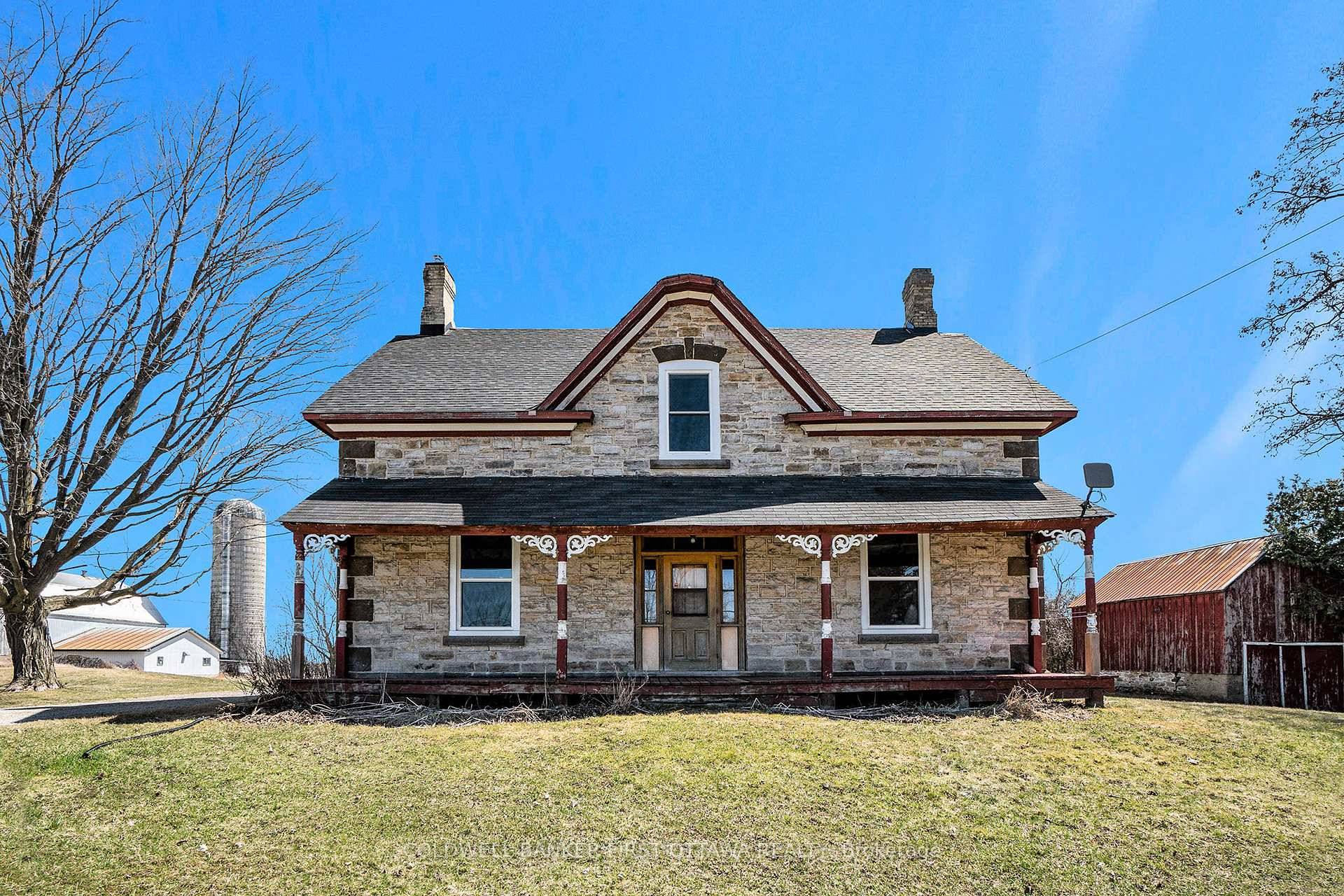 Classic two story stone farmhouse, sitting on 37 acres of fertile farmland, offers historic charm without skimping on modern amenities.