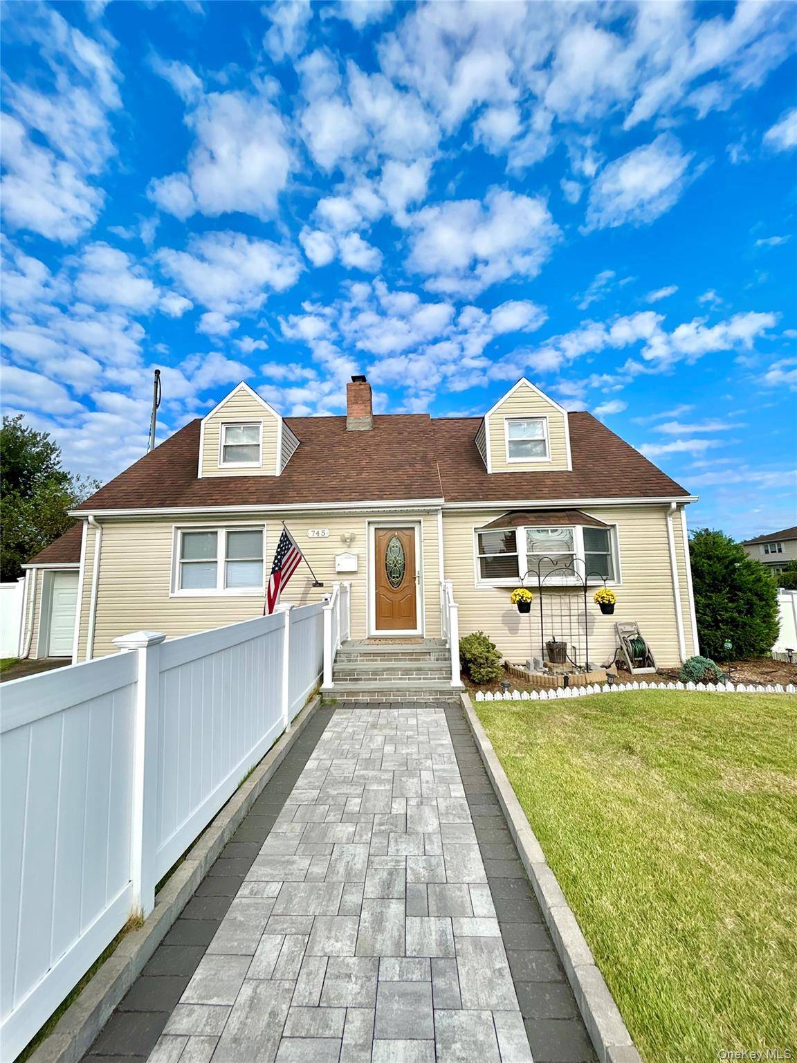 Welcome to this beautifully appointed family home, offering a perfect blend of comfort, space, and convenience in the heart of Bethpage.