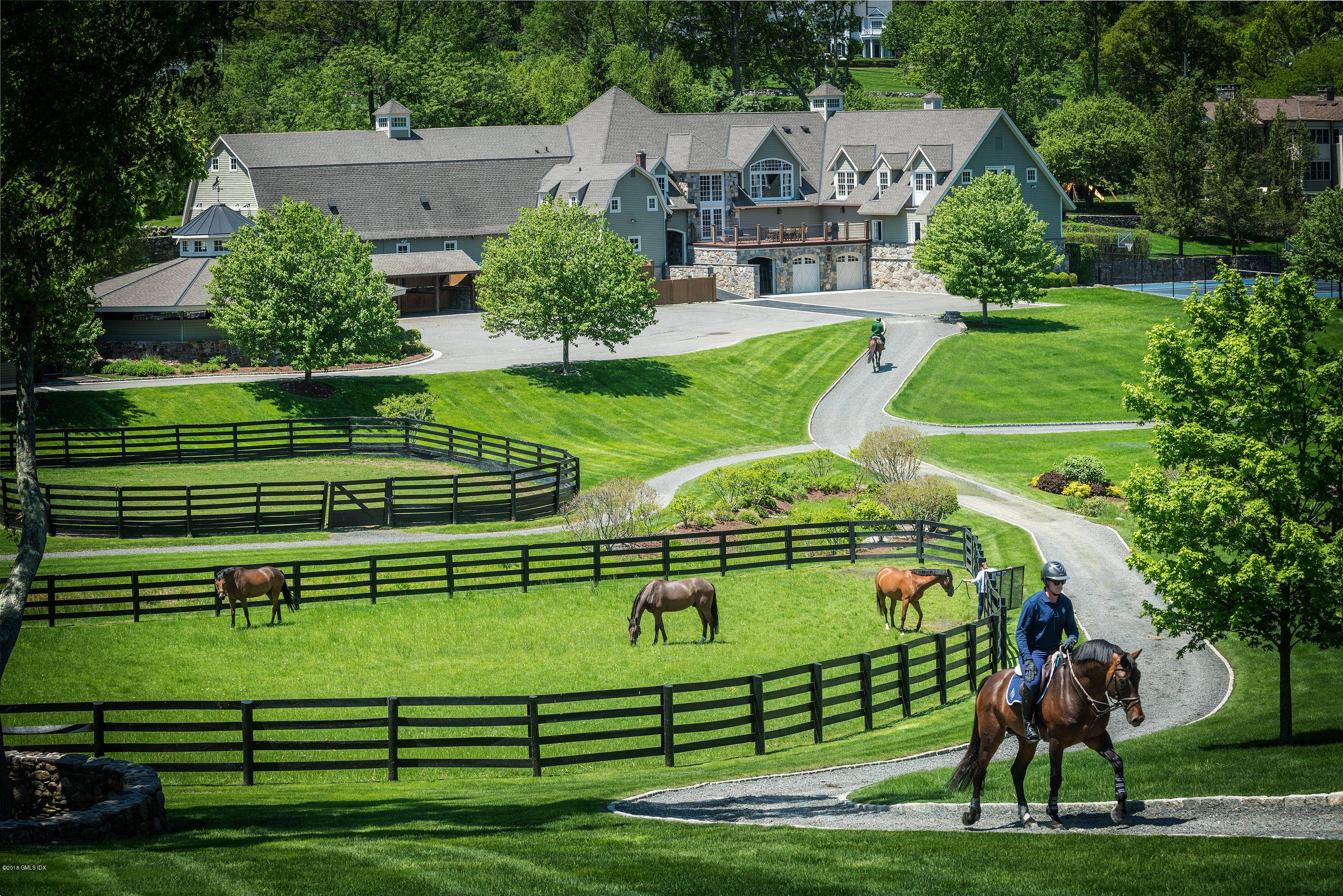 Double H Farm is an extraordinary one of a kind equestrian compound on 87 acres of lush landscaping.