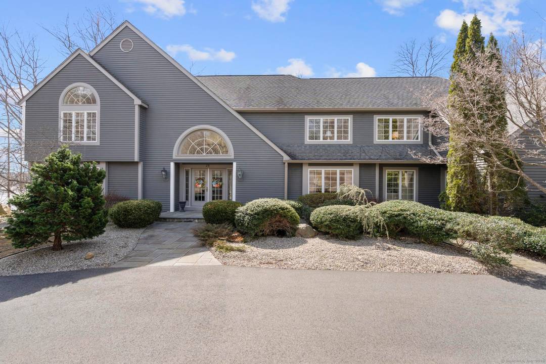 This spectacular waterfront home sits on 2.