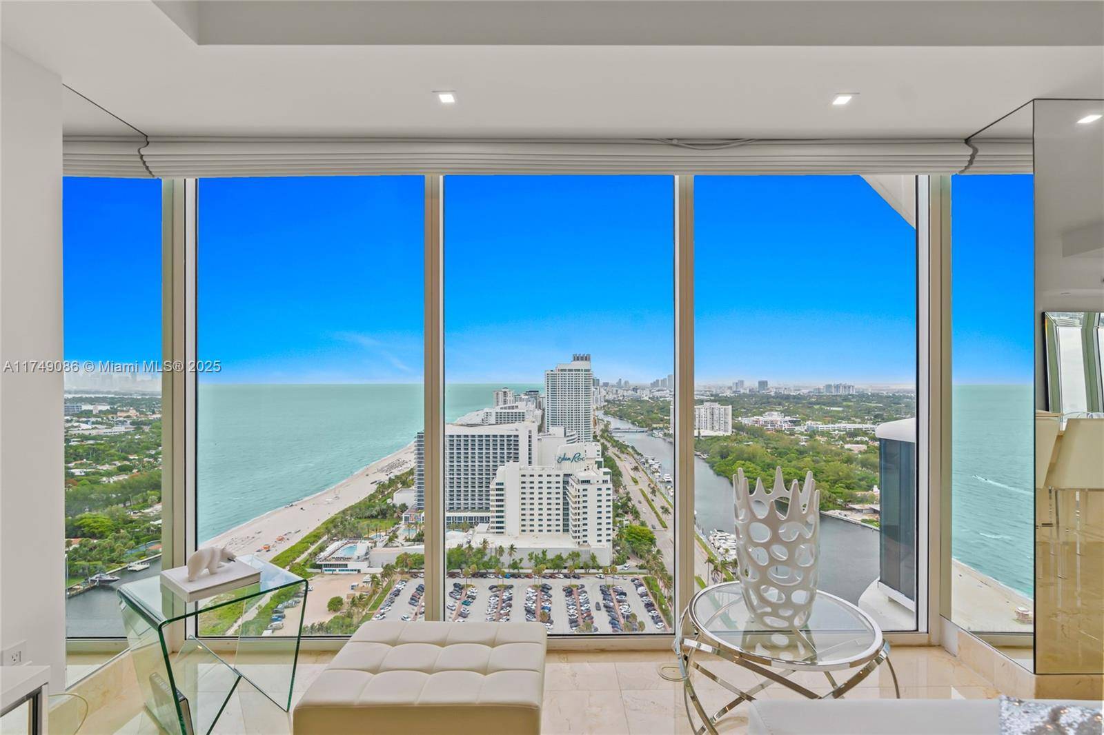 Enjoy spectacular, unobstructed ocean, city, and bay views from this stunning 35th floor Green Diamond condo.