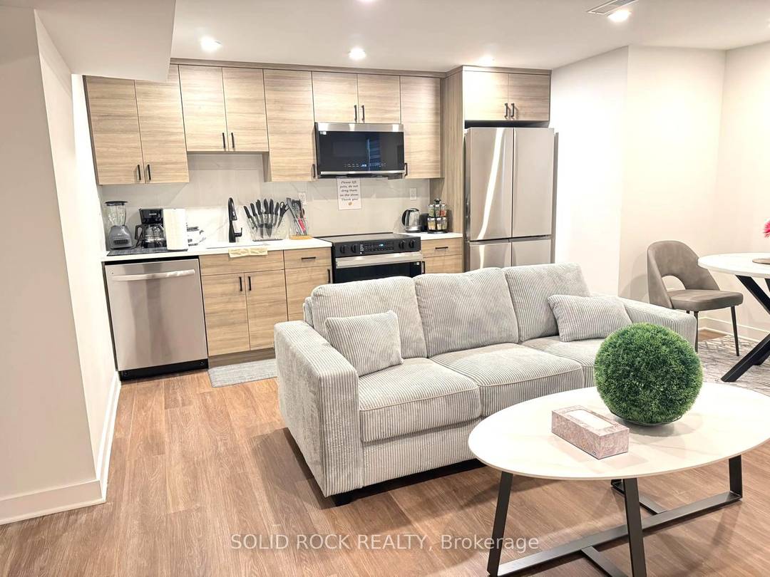 Welcome to this rare, private basement unit with a separate entrance, offering the perfect blend of modern comfort, everyday convenience, and contemporary style.