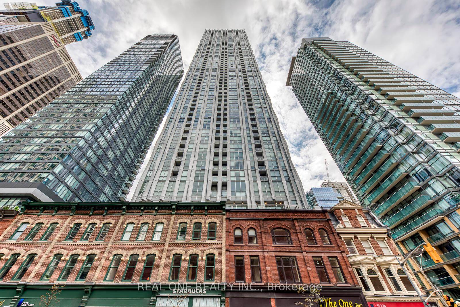 Fully Furnished South Facing 1 Bedroom Suite with Lake Views in Prime Downtown Toronto.