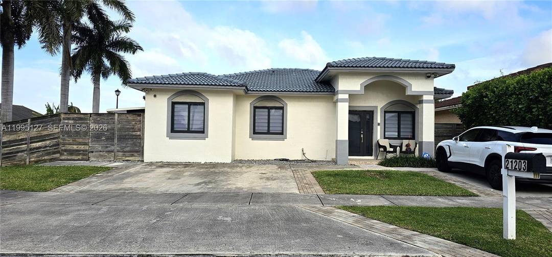Stunning corner home located in Miami Dade, situated on one of the largest lots in the subdivision.