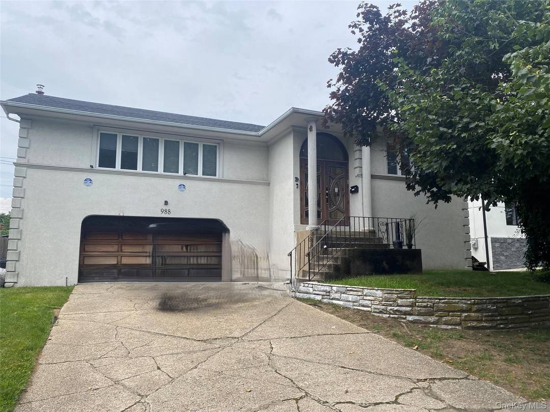 Spacious stucco, detached, with attached two car garage, and large yard Finished walk out basement, lots of light throughout