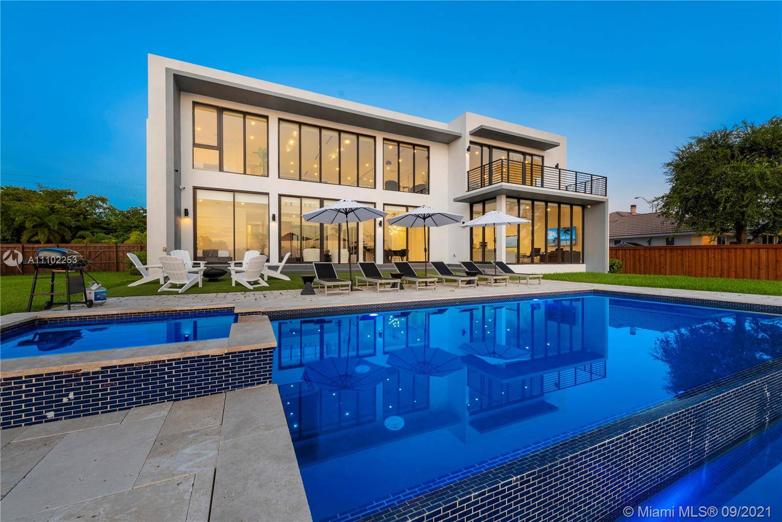 Behold this breath taking lakefront home with spectacular water views from every angle in this one of a kind 5 bedroom, 5, 603 square foot masterpiece.