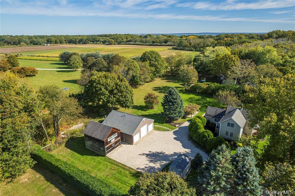 Set on 1. 16 acres of beautifully landscaped grounds, this charming and nostalgic property offers exceptional privacy and endless possibilities.