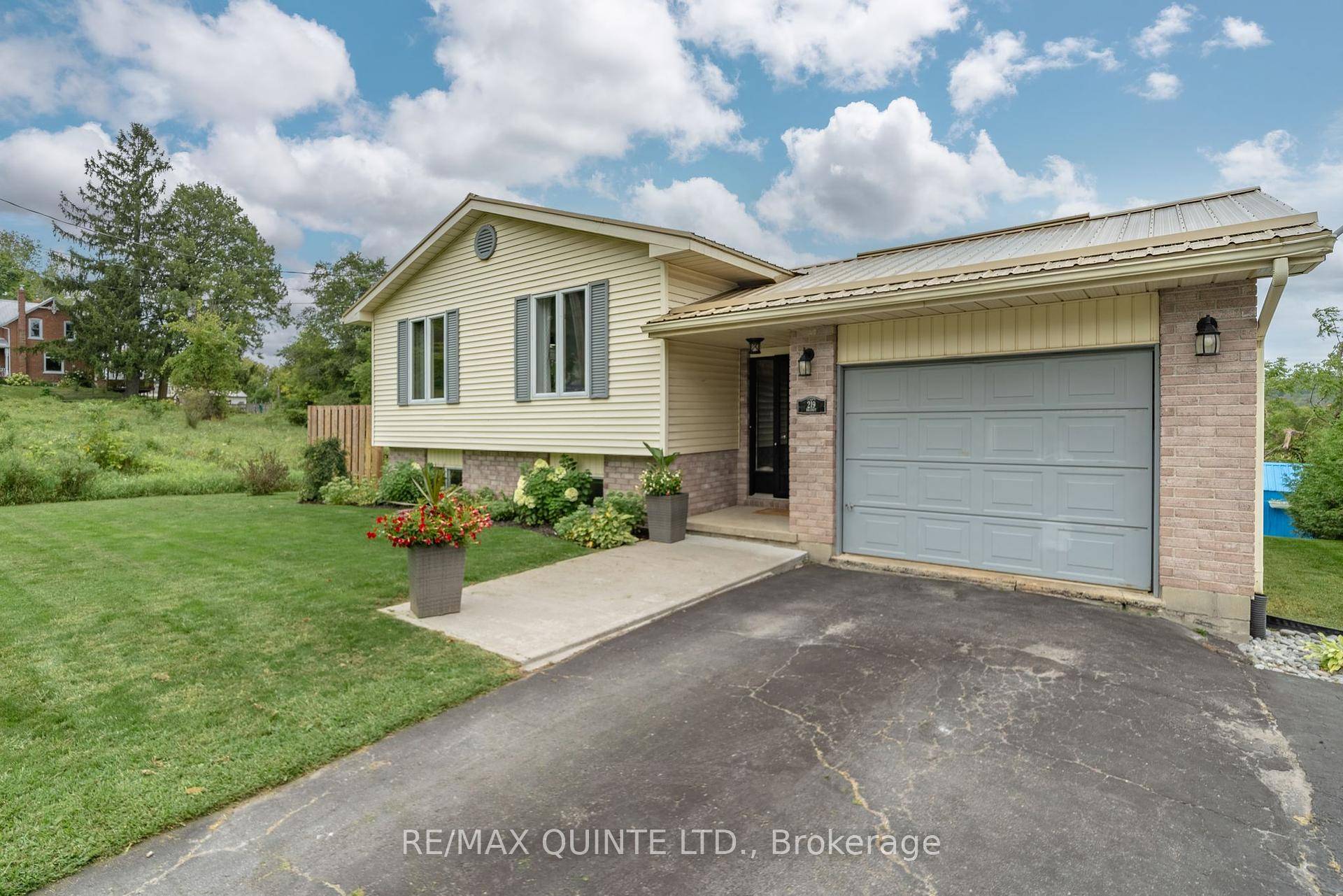 Bright, open, and move in ready ; this beautifully updated raised bungalow backs onto serene green space for the ultimate in privacy and views.