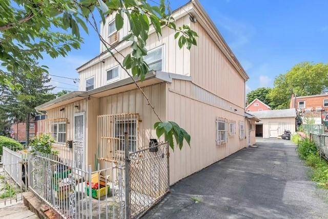 Detached legal two family, located at the boarder of Elmhurst and Middle Village, 10 mins walk to Queens Center Mall Macys and Woodhaven Blvd station E, F, M, R, just ...