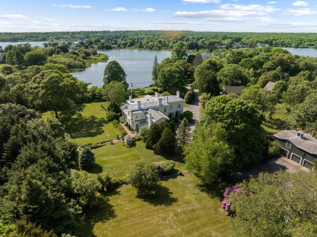 Cove Lawn is a Historic Italianate Estate with Water Views and Guest House.