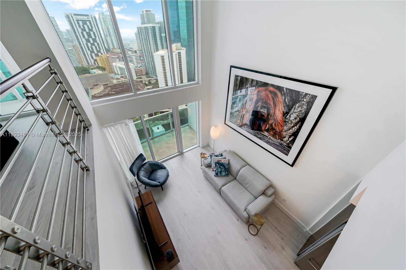 Discover a blend of minimalism and luxury in Brickell with this stunning 2 story art loft.