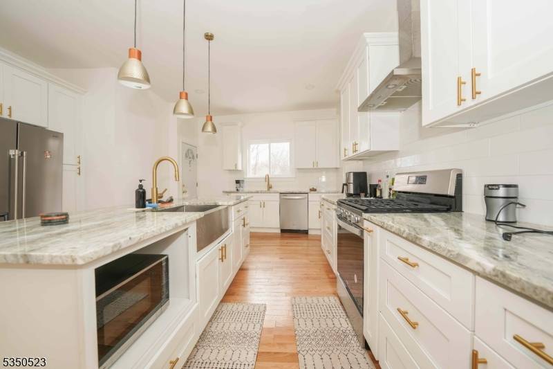 Stunning 4 bedroom, 3. 5 bath Colonial, fully renovated and move in ready !
