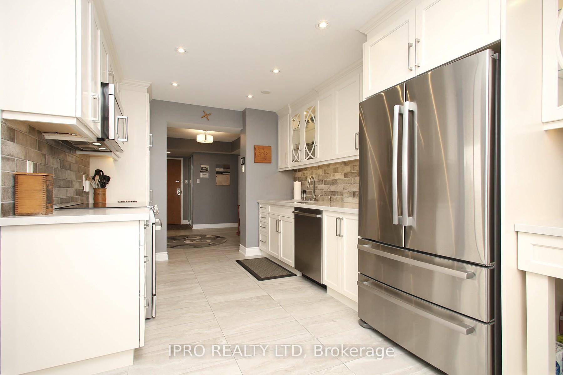 WELCOME TO THIS LOVELY BRIGHT AND SPACIOUS CORNER UNIT.