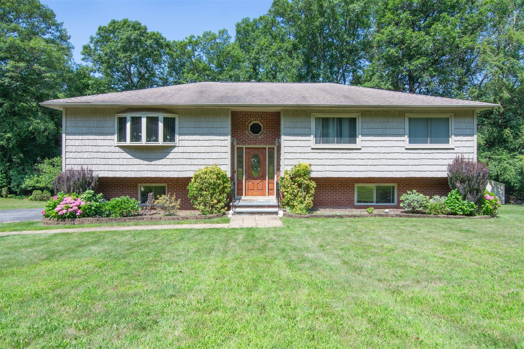 Welcome to this wonderful raised ranch located on a quiet cul de sac.