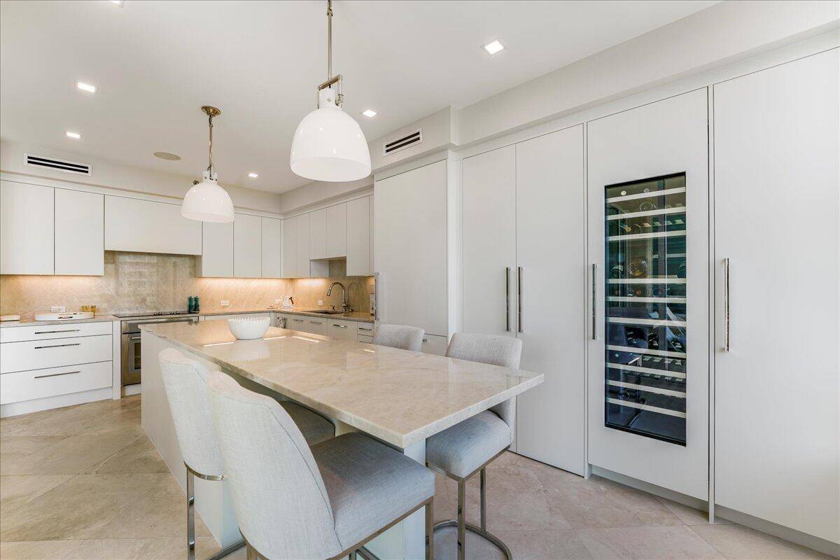 Step off the private elevator into this beautifully renovated 2 bedroom, 2.