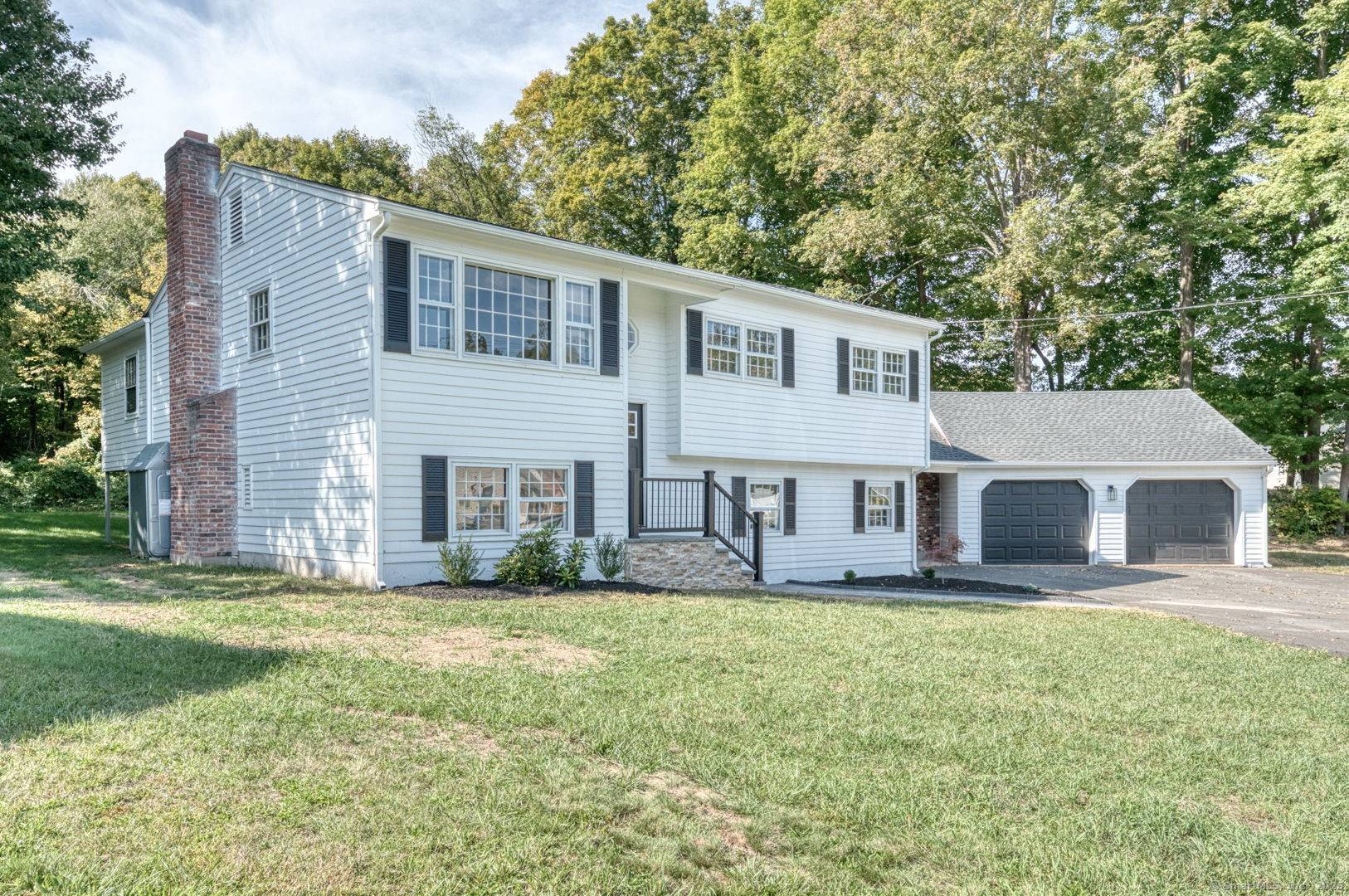 Welcome to this beautifully renovated 4 bedroom, 3 bathroom home located in one of Southington's most desirable neighborhoods.