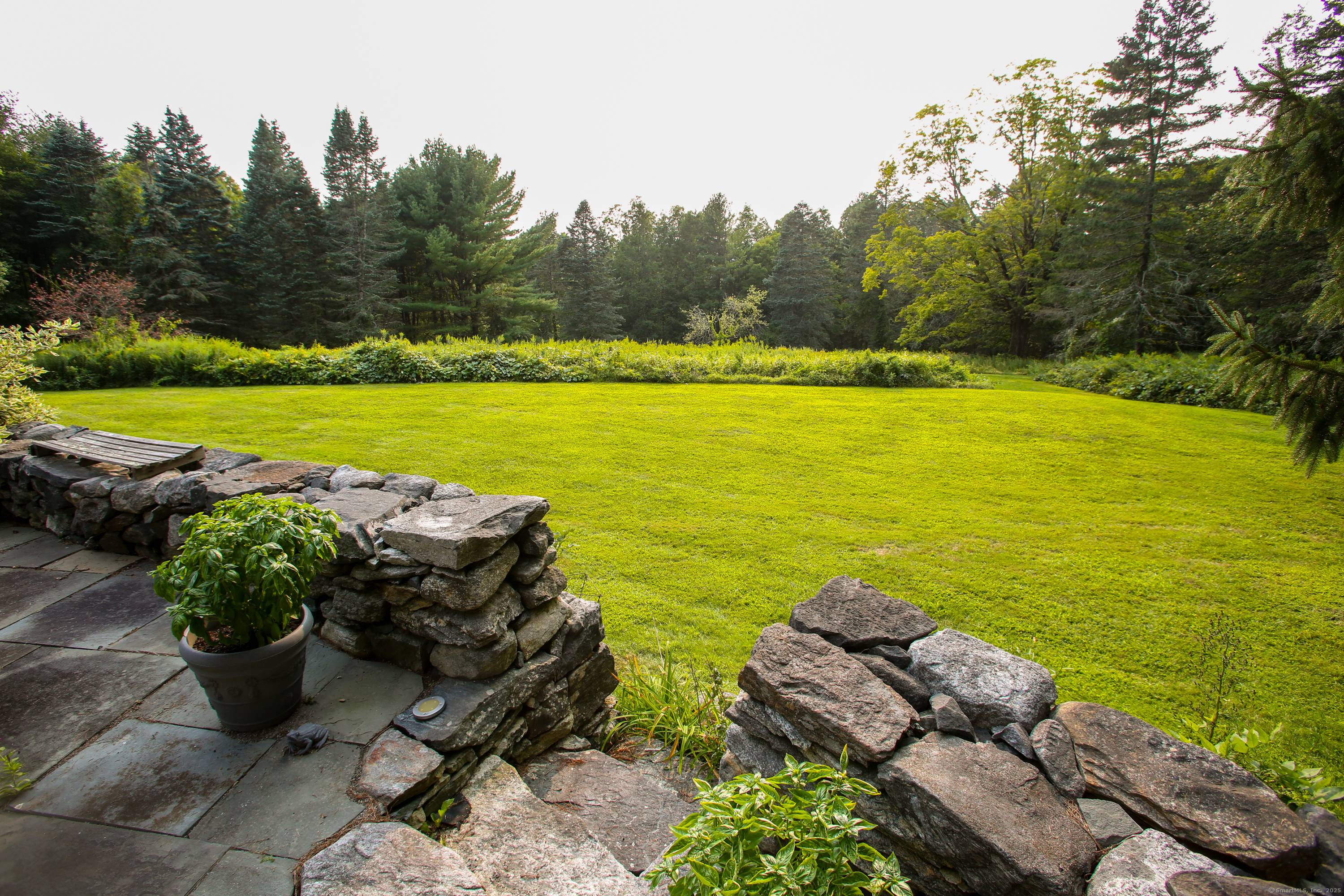 Dream retreat in South Kent on nearly 25 high acres with potential to create views of rolling hills to the west.