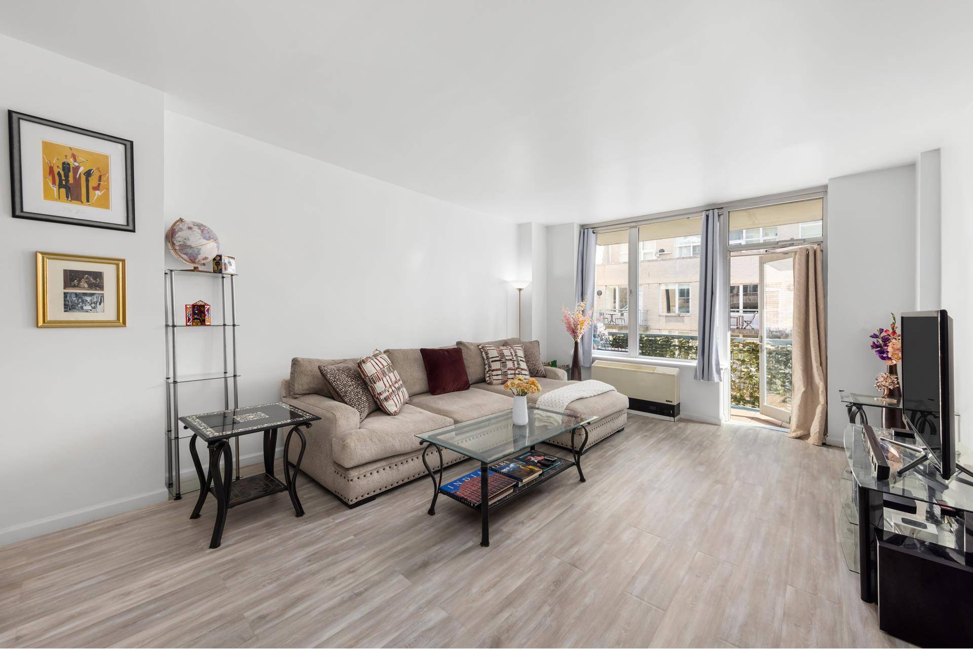 Residence 402 is an expansive two bedroom, two bathroom apartment located in one of the most desirable waterfront condominiums Williamsburg has to offer.