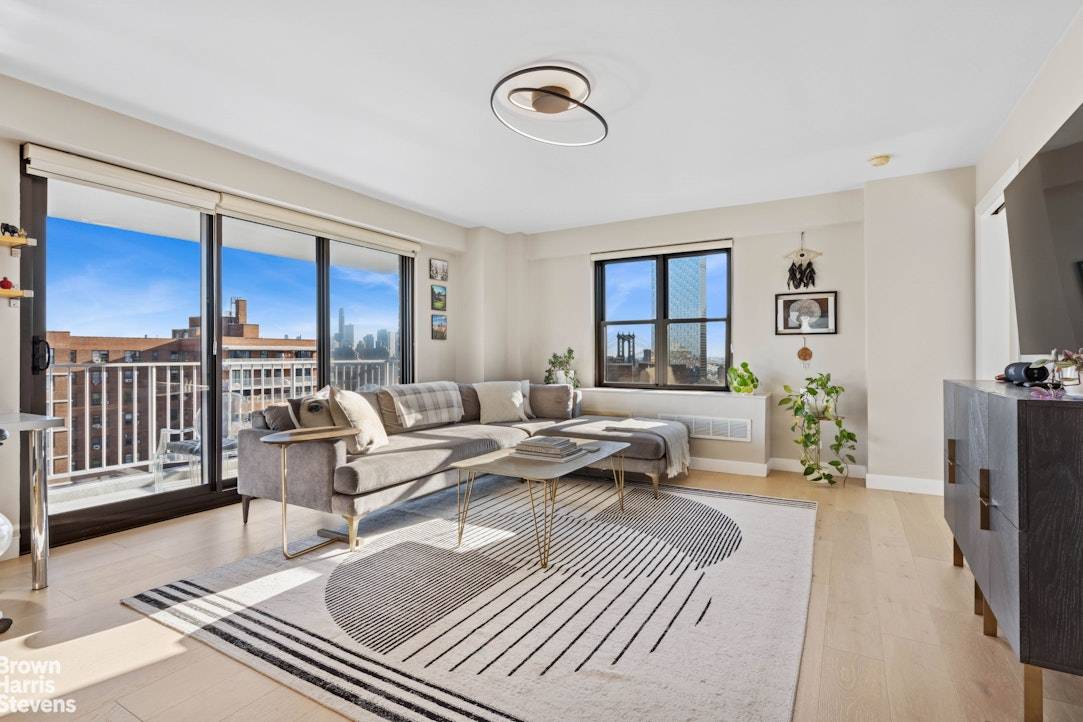 One of a Kind ! This fully renovated top floor home features an expansive great room opening to a 125 square foot private terrace with dramatic views to the downtown ...