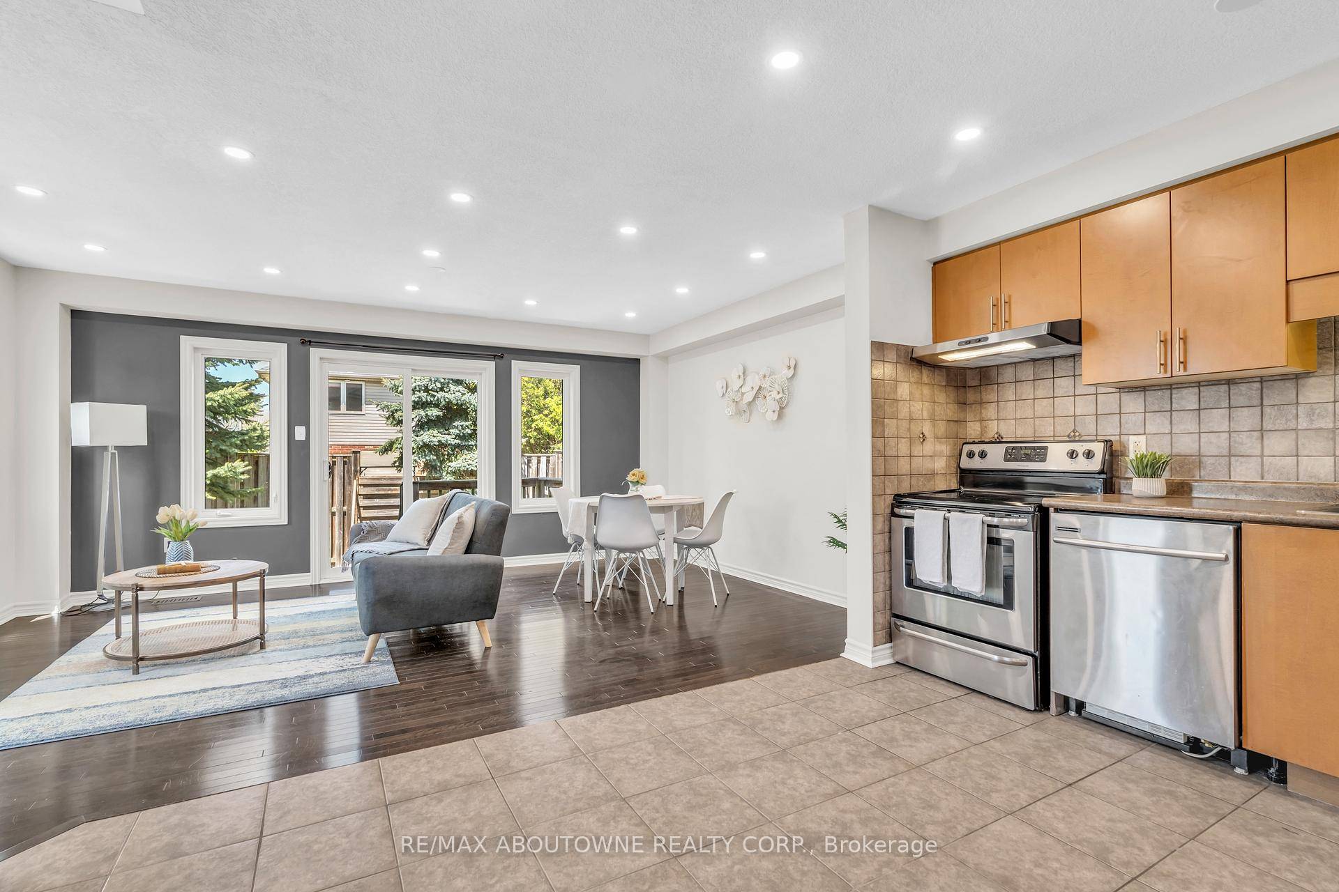 Surrounded by top rated elementary schools, a future high school, parks, and scenic trails, this bright and well maintained end unit townhouse with a finished basement is sure to impress.