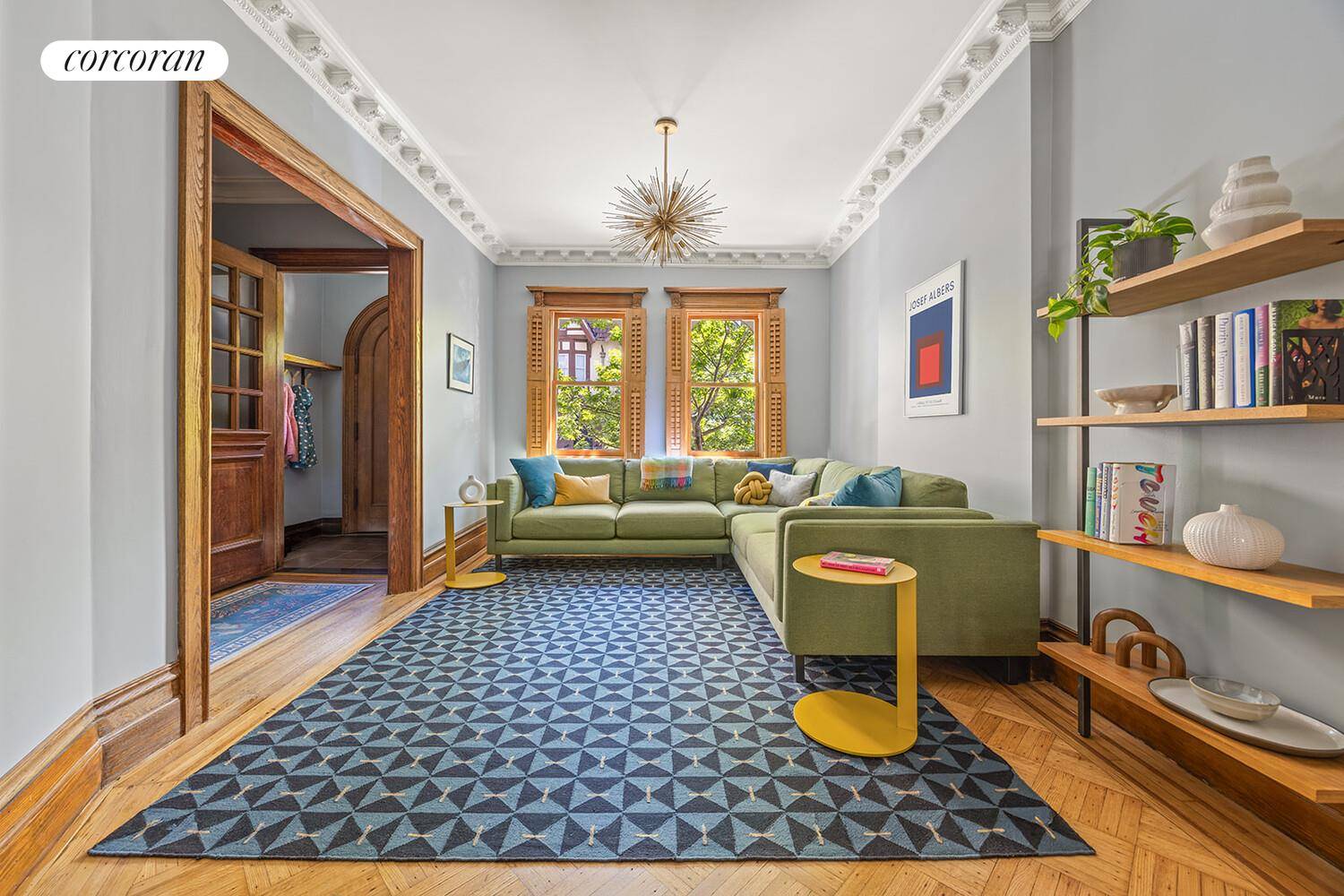 Nestled on a storybook block in Prospect Lefferts Gardens, this meticulously renovated Tudor townhouse blends historic charm with modern sophistication.
