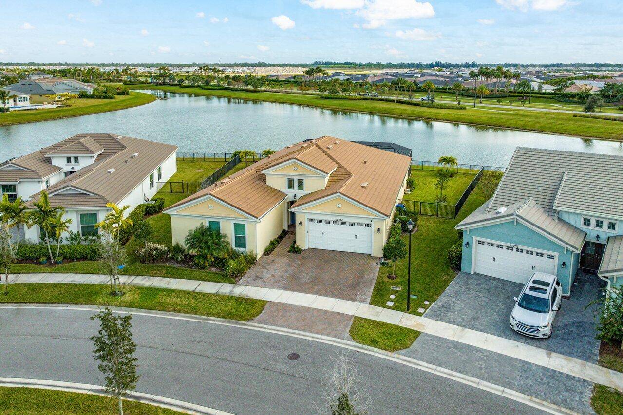 Beautiful and rarely available one story Kingfisher Grand model with a pristine lake view in the in the sought after City of Westlake !