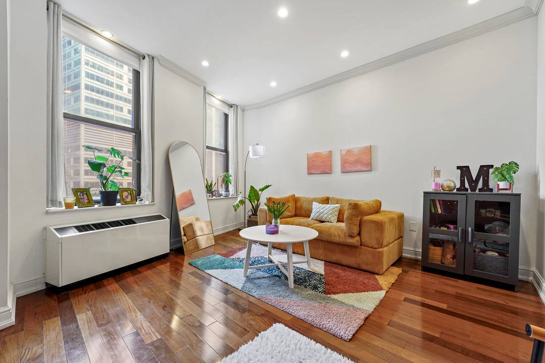 Perfectly positioned at one of Downtown Manhattan's most recognizable corners, this investor ready residence at the landmark Cocoa Exchange is delivered with a tenant in place, offering immediate rental income ...