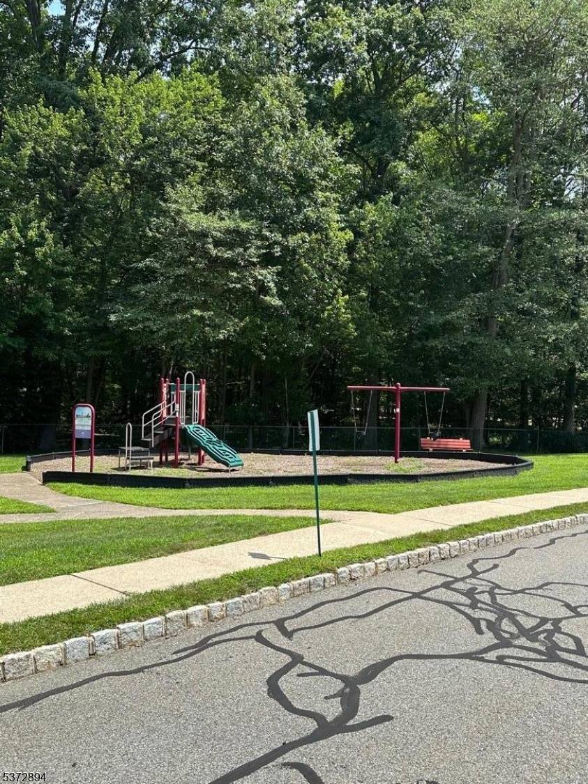 LOCATION LOCATION LOCATION this perfectly situated home is near all your favorite shopping and major roadways.