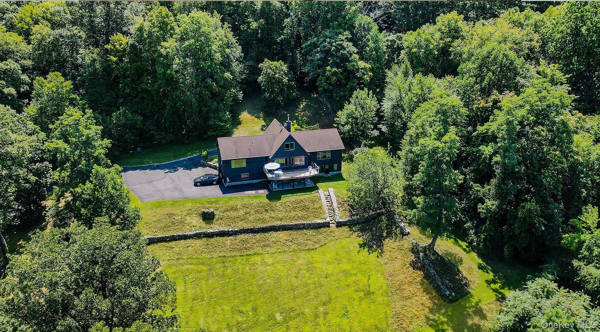 A Rare Hudson Valley Retreat 51 Private Acres Overlooking the Hudson River and beyond.