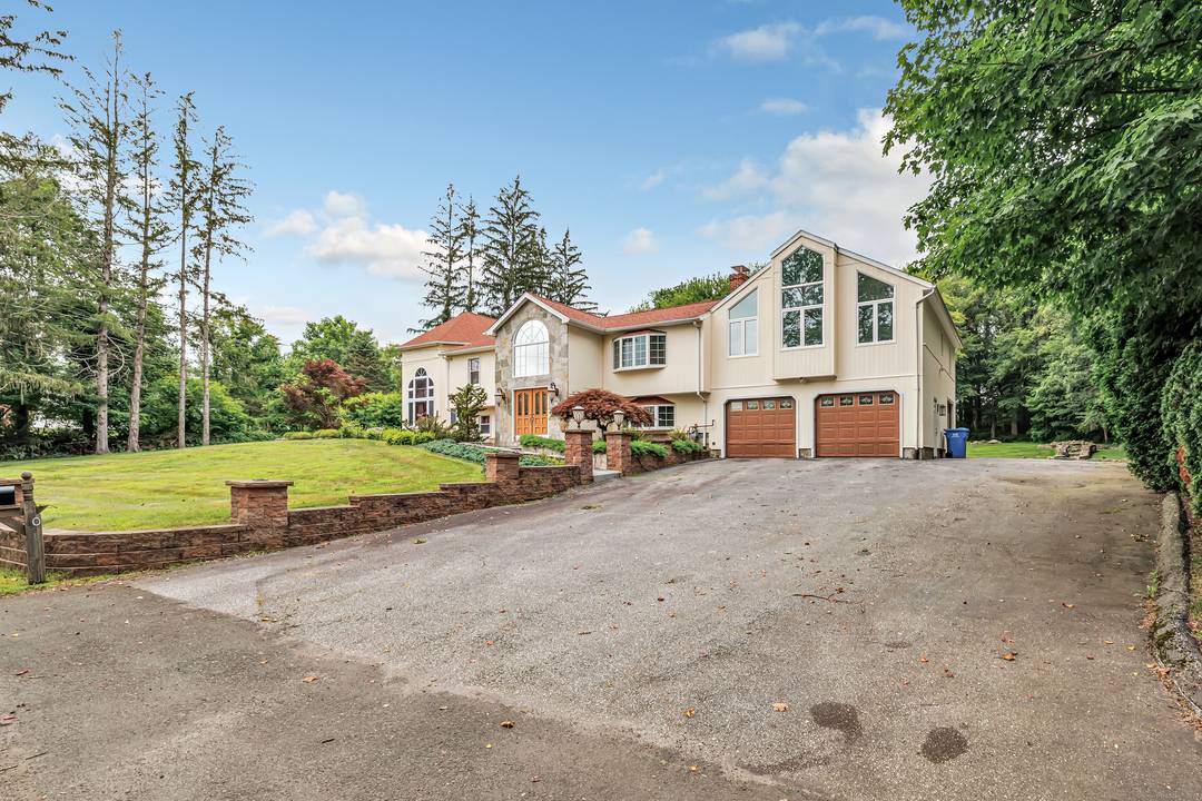 Welcome to this magnificent custom built raised ranch known as 40 Walnut Street located in Fairfield County in the Town of Monroe.