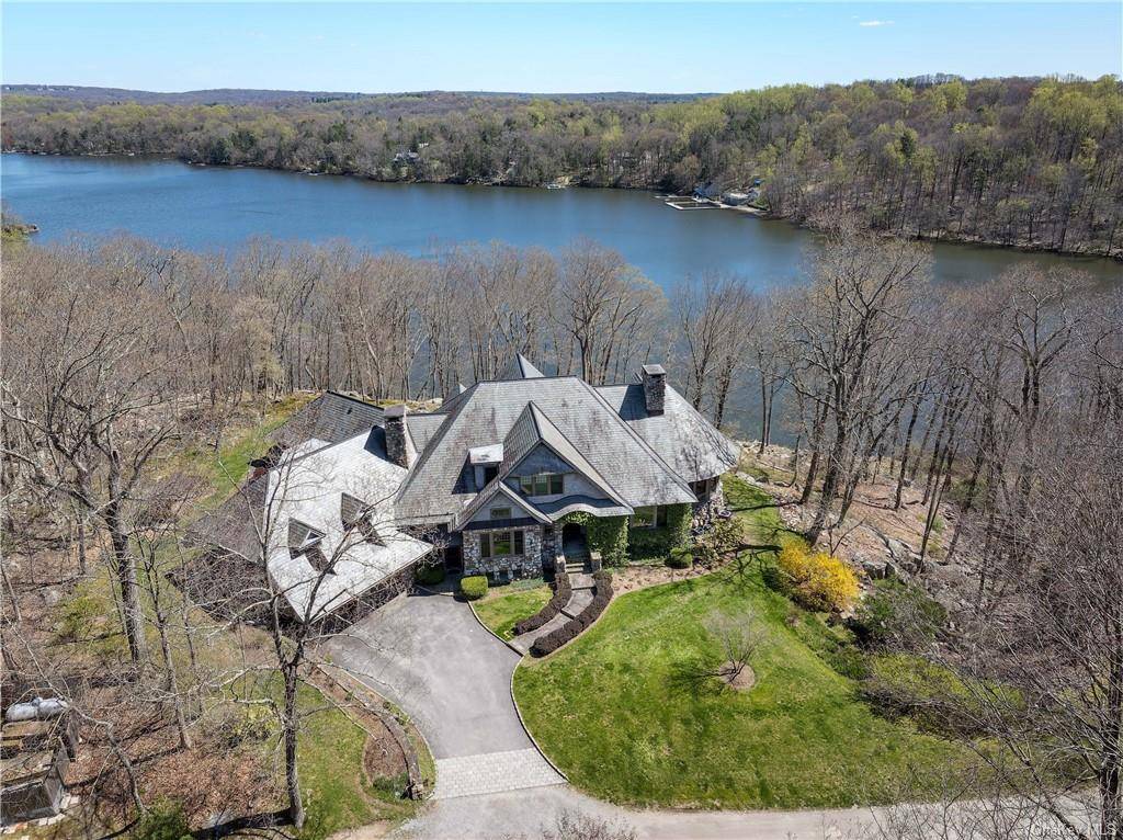 Stunning Cedar and Stone masterpiece on Lake Waccabuc.