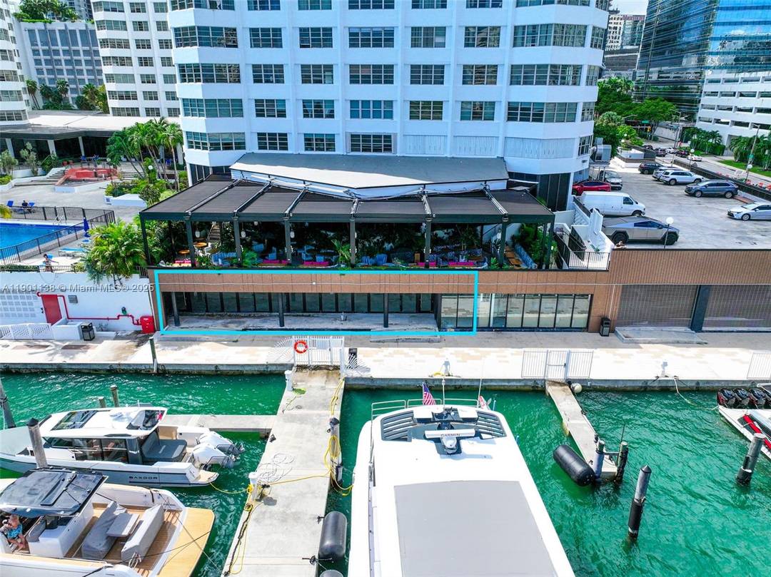 The Property 5, 411 SF commercial condo Unit 4C042 with direct frontage along the historic Four Ambassadors waterfront concourse on the Brickell Bay Boardwalk a rare bayfront location ideal for ...