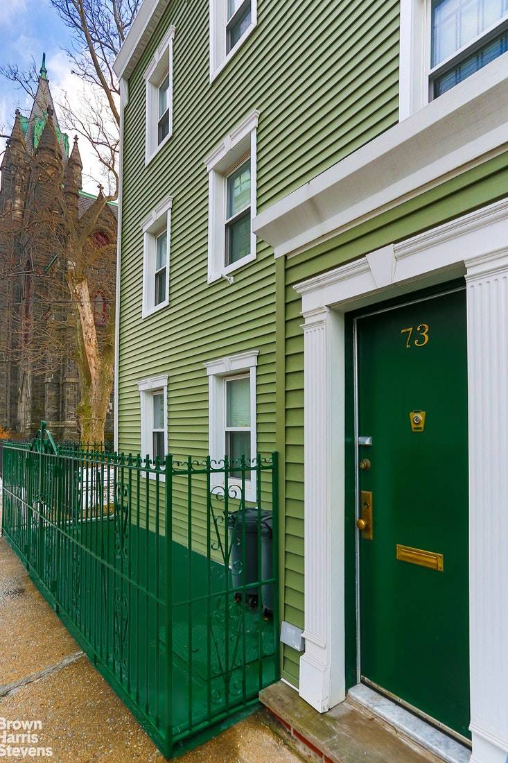Beautifully renovated 1 family triplex plus semi finished basement in red hot Red Hook.